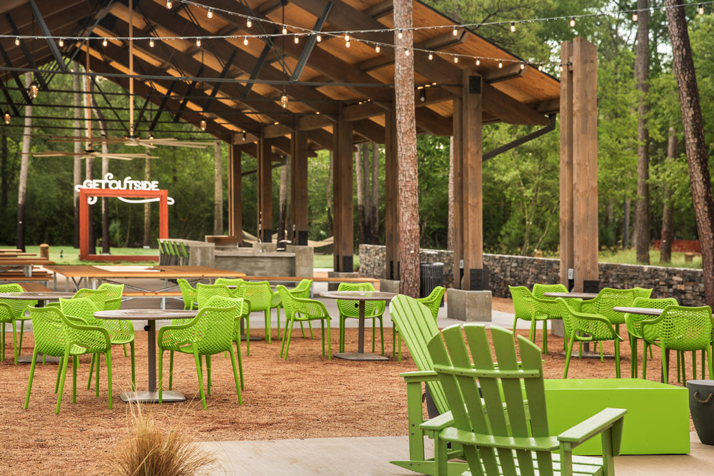 Residents can relax outdoors in the seating area located in The Hearth Amenity Center.