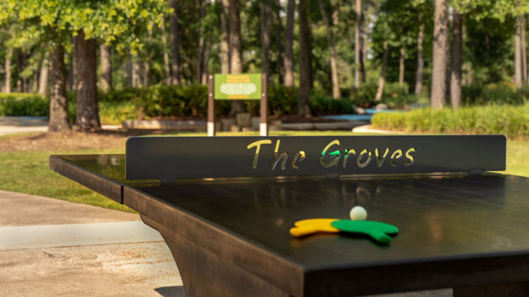 Get competitive while playing ping-pong in the great outdoors.