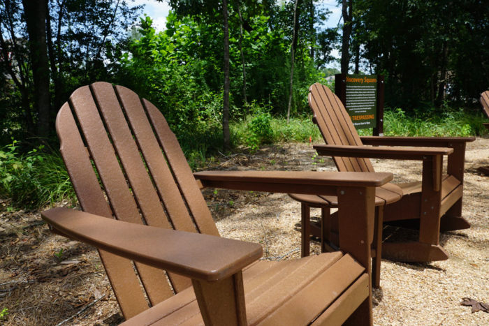 While your children play, residents can keep watch of the play area in our unique adirondack chairs in Discovery Square.