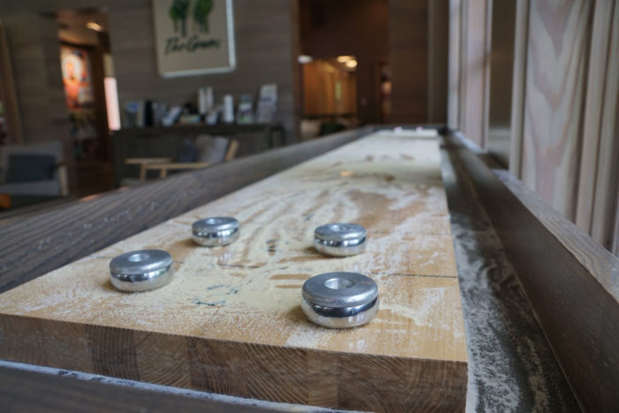 Challenge opponents to a game of shuffleboard, located inside of the Lifestyle Center.