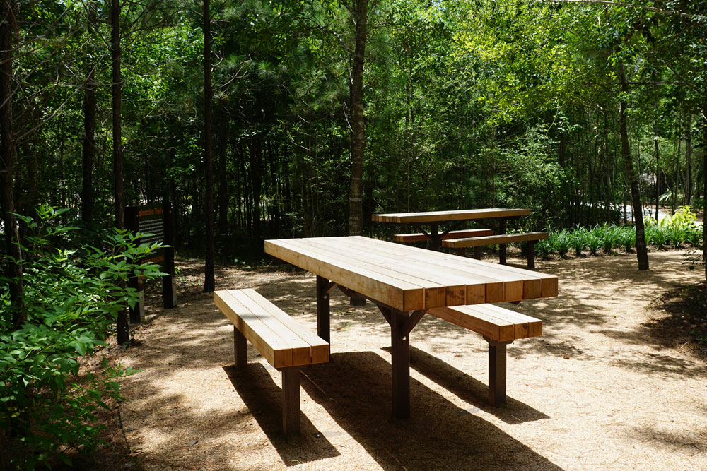 Relax at the picnic benches located throughout Exploration Trails.