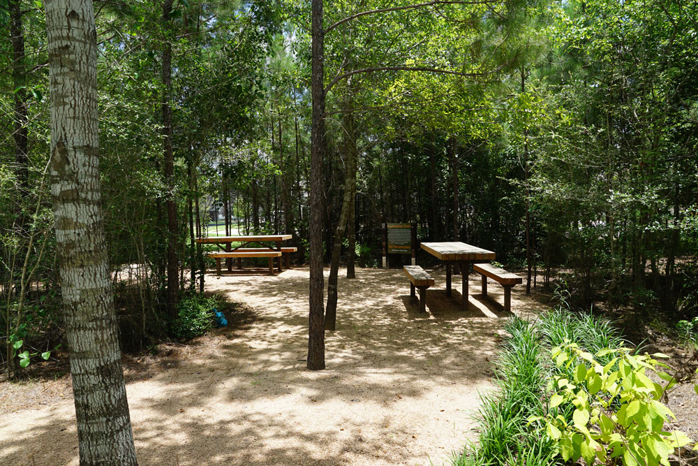 Relax at the picnic benches located throughout Exploration Trails.